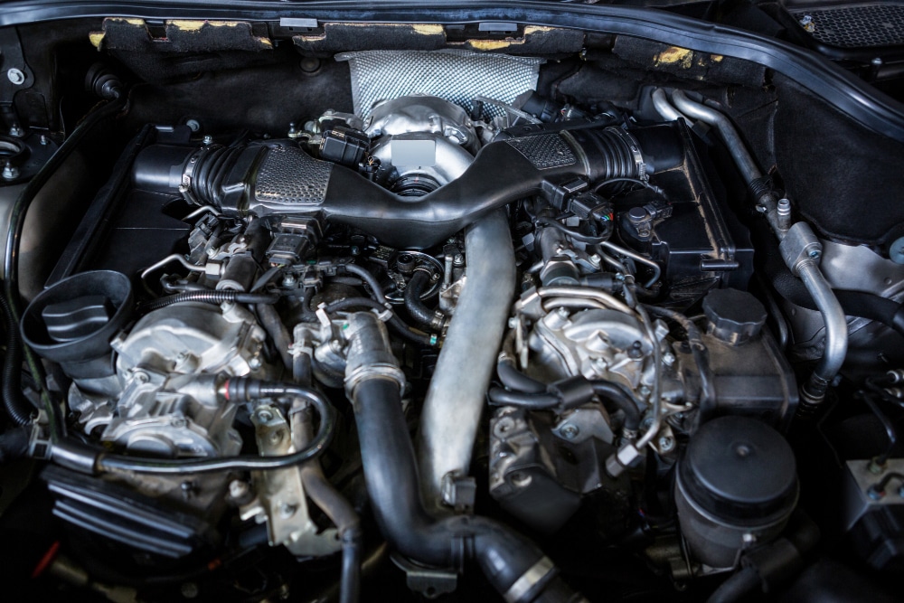 Cooling system repair on a vehicle at Tampa Bay Quick Lube auto shop in Tampa, FL